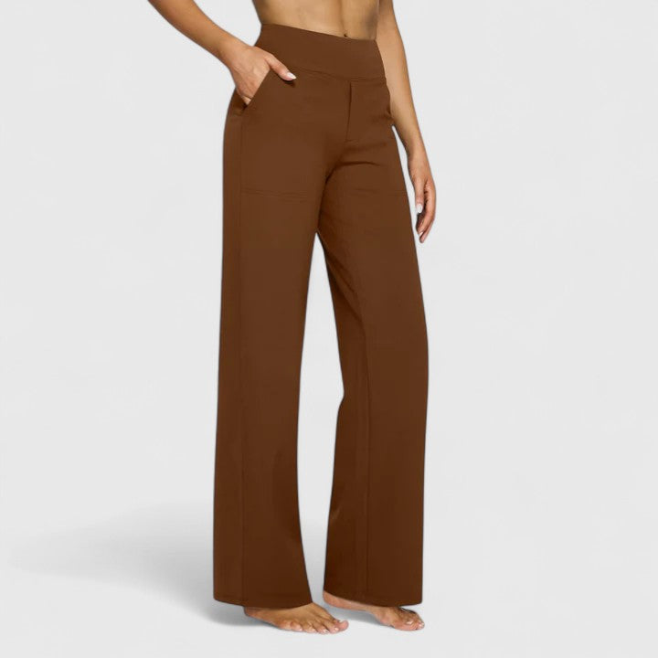 Vivienne women's pull-on wide waistband trousers in rich brown, featuring deep side pockets and a refined finish.