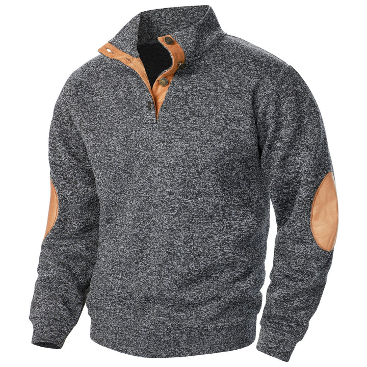 Grey marled knit quarter-button sweater with tan suede-style collar trim and elbow patches.