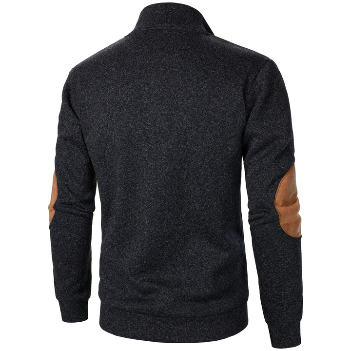 Back view of a charcoal marled knit sweater featuring brown suede elbow patches and a ribbed hem.