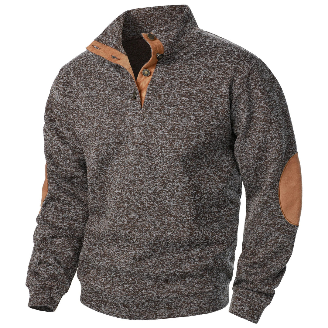 Brown marled knit quarter-button sweater with a stand-up collar and tan suede-style elbow patches and trim.