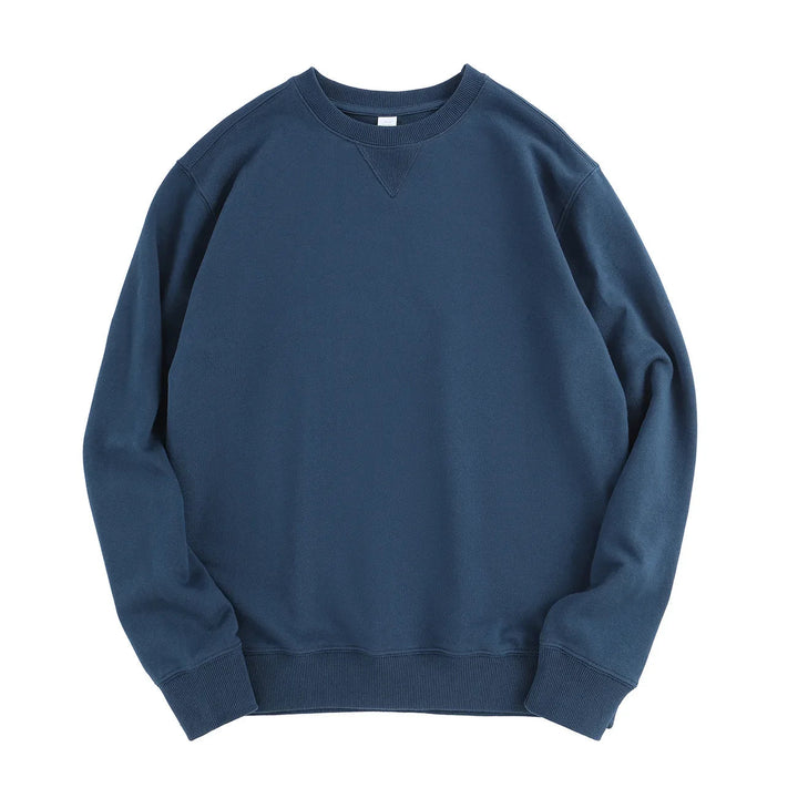 Navy blue men's crew neck sweatshirt in soft cotton with ribbed cuffs, hem, and a signature V-stitch front detail.
