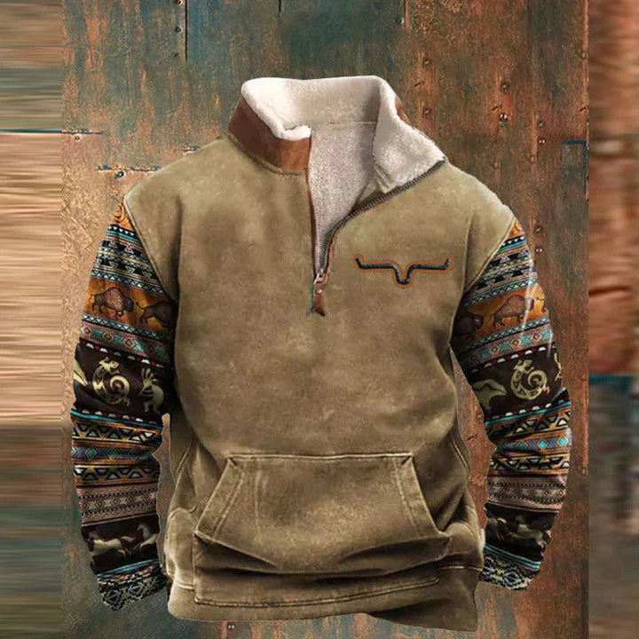 Tan quarter-zip jumper with sherpa-lined collar, longhorn chest motif, and patterned Aztec sleeves with kangaroo pocket.